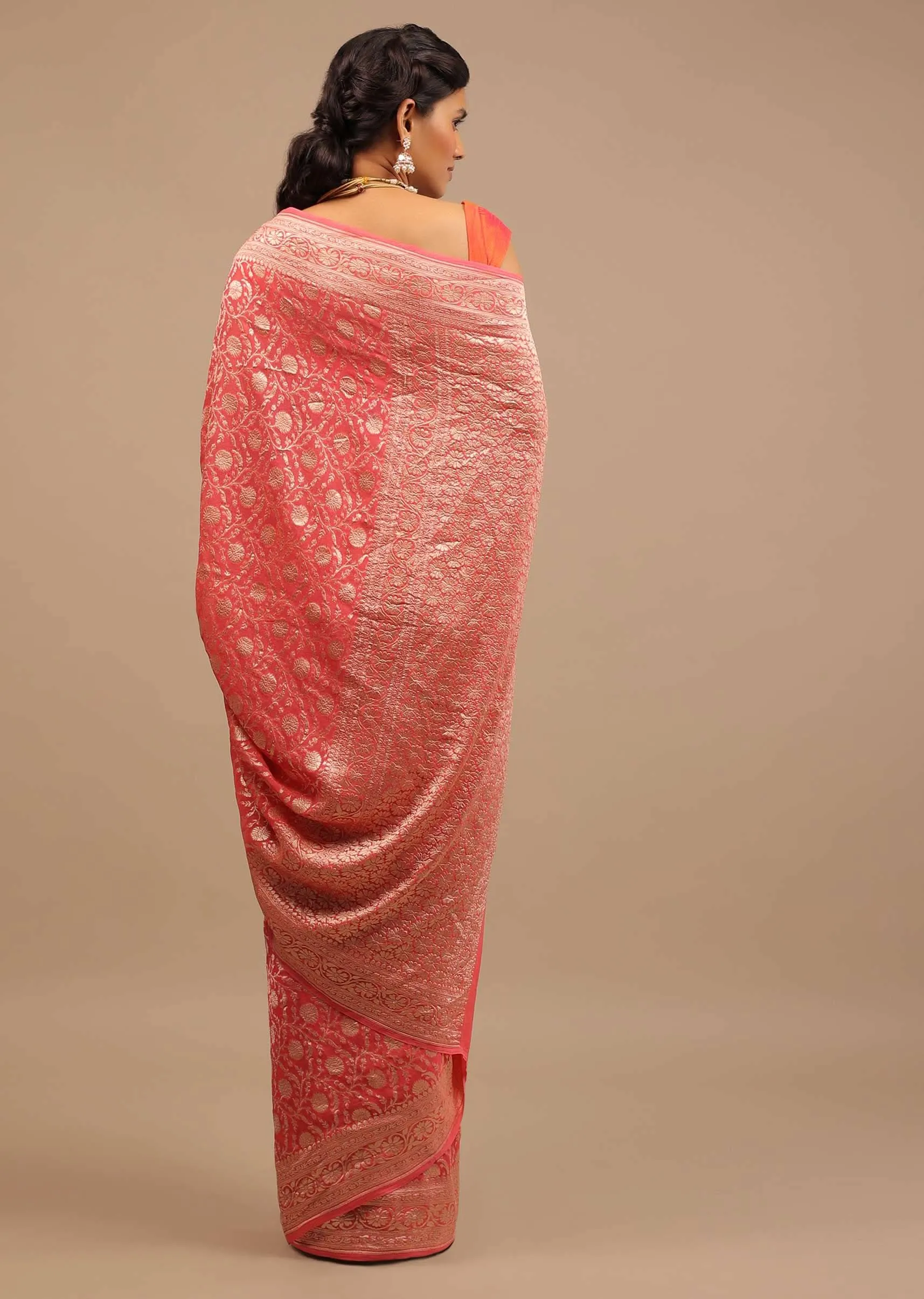 Coral Pink Saree In A Traditional Silhouette In Georgette With Floral Jaal Work